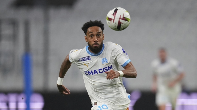 Marseille's Pierre-Emerick Aubameyang? is in action during a French League One soccer match between Marseille and Lens at the Stade Velodrome stadium in Marseille, France, Sunday, April 28, 2024. (AP Photo/Daniel Cole)