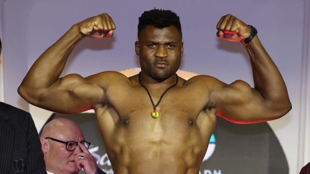 RIYADH, SAUDI ARABIA - MARCH 07: Francis Ngannou poses for a photo as he weighs in ahead of his 'Knockout Chaos' heavyweight fight against Anthony Joshua at Greece in Boulevard World on March 07, 2024 in Riyadh, Saudi Arabia. (Photo by Richard Pelham/Getty Images) Eddie Hearn Frank Warren