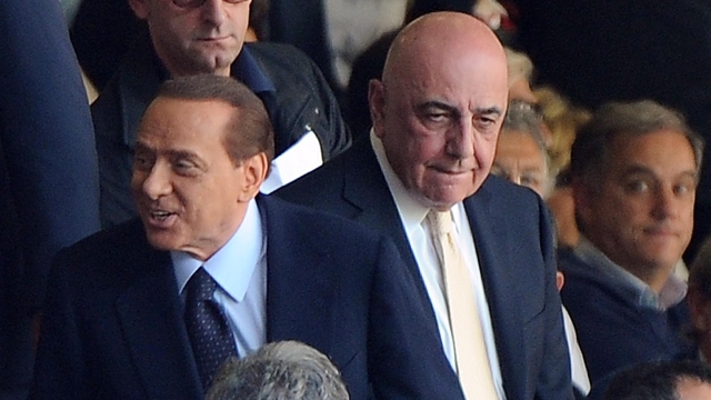 Italian prime minister Silvio Berlusconi (L) and Ac Milan Ceo Adriano Galliani attend a Serie A soccer match between Ac Milan and Bologna at the Giuseppe Meazza stadium in Milan, northen Italy, 1 May 2011. ANSA/DANIEL DAL ZENNARO