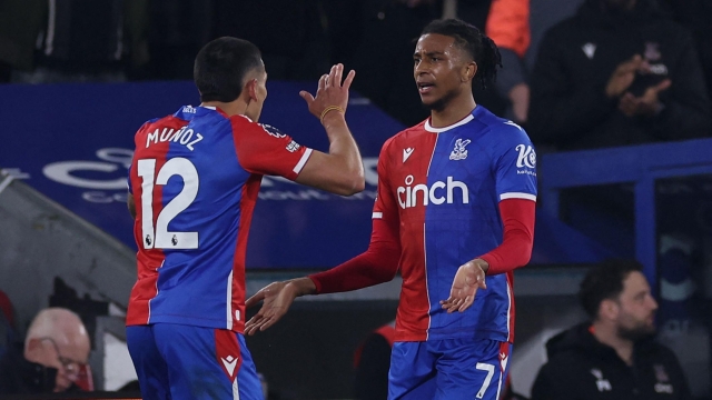 Crystal Palace's French midfielder #07 Michael Olise (R) celebrates with Crystal Palace's Colombian defender #12 Daniel Munoz (L) after scoring their fourth goal during the English Premier League football match between Crystal Palace and Manchester United at Selhurst Park in south London on May 6, 2024. (Photo by Adrian DENNIS / AFP) / RESTRICTED TO EDITORIAL USE. No use with unauthorized audio, video, data, fixture lists, club/league logos or 'live' services. Online in-match use limited to 120 images. An additional 40 images may be used in extra time. No video emulation. Social media in-match use limited to 120 images. An additional 40 images may be used in extra time. No use in betting publications, games or single club/league/player publications. /