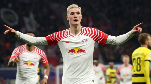 LEIPZIG, GERMANY - DECEMBER 13: Benjamin Sesko of RB Leipzig celebrates after scoring their team's first goal during the UEFA Champions League match between RB Leipzig and BSC Young Boys at Red Bull Arena on December 13, 2023 in Leipzig, Germany. (Photo by Alexander Hassenstein/Getty Images)