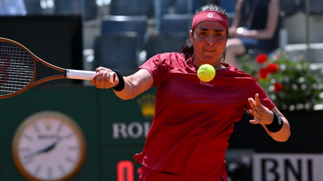 Tunisia's Ons Jabeur returns the ball to USA's Sofia Kenin during the Women's WTA Rome Open tennis tournament at Foro Italico in Rome on May 10, 2024. (Photo by Andreas SOLARO / AFP)