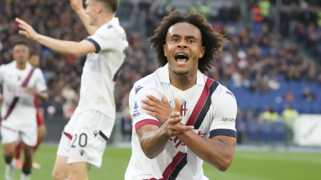 Bologna's Joshua Zirkzee celebrates after scoring the second goal against Roma during the Italian Serie A soccer match between Roma and Bologna at Rome's Olympic Stadium, Monday, April 22, 2024. (AP Photo/Gregorio Borgia)