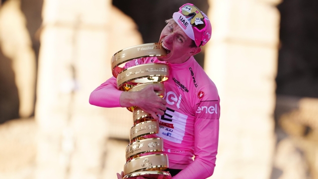 Pogacar Tadej (Team Uae Emirates) pink jersey on the podium with the trophy after the victory of the race during the stage 21 of the Giro d'Italia from Roma to Roma, Italy. Sunday, May 26, 2024. (Photo by Fabio Ferrari/LaPresse)