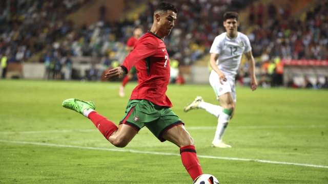 Portugal's Cristiano Ronaldo with the ball during a friendly soccer match between Portugal and Ireland at the Aveiro Municipal stadium in Aveiro, Portugal, Tuesday, June 11, 2024. (AP Photo/Luis Vieira)