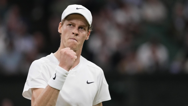 Jannik Sinner of Italy reacts after winning a point against Miomir Kecmanovic of Serbia in their third round match at the Wimbledon tennis championships in London, Friday, July 5, 2024.