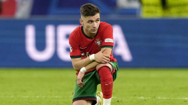 Portugal's Francisco Conceicao reacts after losing a quarter final match between Portugal and France at the Euro 2024 soccer tournament in Hamburg, Germany, Friday, July 5, 2024. France won a penalty shoot out 4-3 after the match ended in a 0-0 draw. (AP Photo/Martin Meissner)