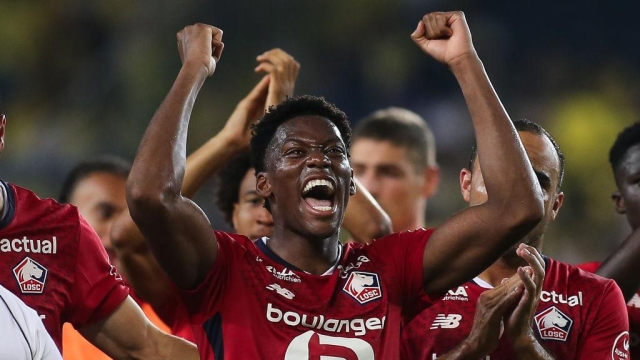 ISTANBUL, TURKEY - AUGUST 13: Jonathan David of Lille celebrates victory during the UEFA Champions League Third Qualifying Round match between Fenerbahce and Lille FC at Ulker Stadium on August 13, 2024 in Istanbul, Turkey. (Photo by Ahmad Mora/Getty Images)