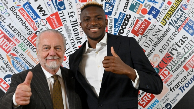 Napoli's president Aurelio De Laurentiis (L) and Napoli's Nigerian forward Victor Osimhen prior to be awarded as 'Best Foreign Athlete of the Year' by Italian foreign press association in Rome, Italy, 06 March 2023. ANSA/ETTORE FERRARI