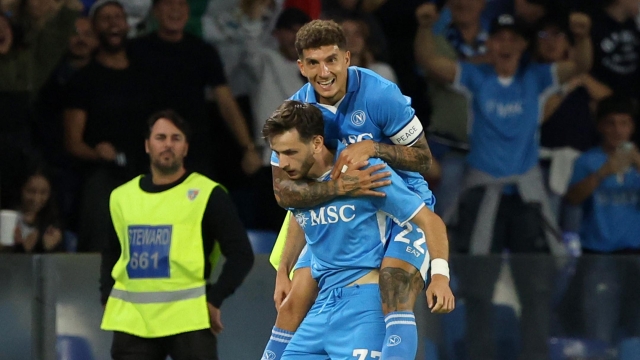 NAPLES, ITALY - SEPTEMBER 29: Khvicha Kvaratskhelia of SSC Napoli celebrates with Giovanni Di Lorenzo after scoring his side second goal during the Serie A match between Napoli and Monza at Stadio Diego Armando Maradona on September 29, 2024 in Naples, Italy. (Photo by Francesco Pecoraro/Getty Images)