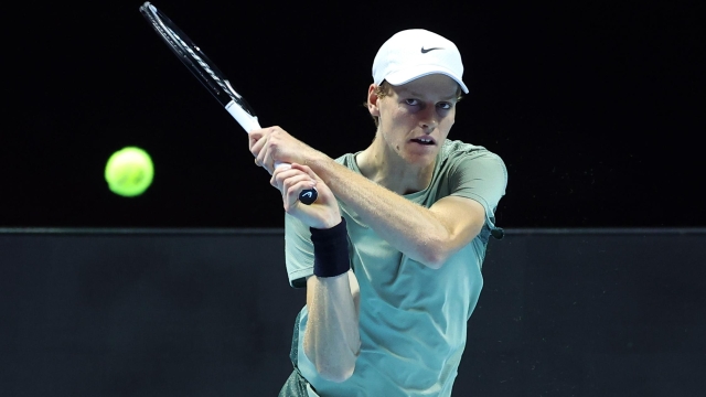 RIYADH, SAUDI ARABIA - OCTOBER 17:  Jannik Sinner of Italy plays a backhand in his Semi Final match against Novak Djokovic of Serbia during day two of the Six Kings Slam 2024 at Kingdom Arena on October 17, 2024 in Riyadh, Saudi Arabia. (Photo by Richard Pelham/Getty Images)