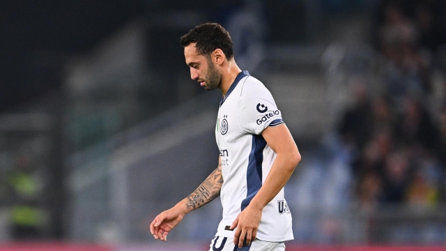 ROME, ITALY - OCTOBER 20:  Hakan Calhanoglu of FC Internazionale reacts during the Serie A match between AS Roma and FC Internazionale at Stadio Olimpico on October 20, 2024 in Rome, Italy. (Photo by Mattia Ozbot - Inter/Inter via Getty Images)