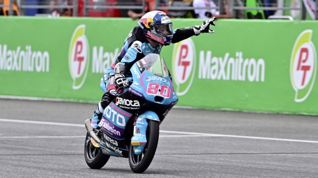 Colombia's rider David Alonso, reacts, winning the Moto3 race of Grand Prix of Thailand at the Chang International Circuit in Buriram, Thailand, Sunday, Oct. 27, 2024. (AP Photo/Kittinun Rodsupan)