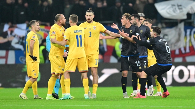 Kosovo's players argue with Romania's players before leaving the pitch during the extra-time of the UEFA Nations League, League C, Group 2 football match between Romania and Kosovo in Bucharest, Romania on November 15, 2024. (Photo by Daniel MIHAILESCU / AFP)