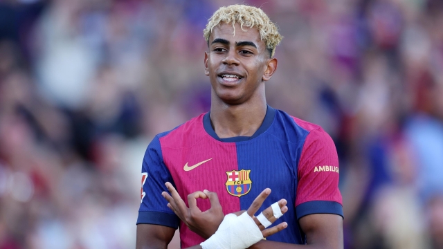 Lamine Yamal of FC Barcelona celebrates scoring his team's first goal during the La Liga EA Sports match between FC Barcelona and Villarreal CF at Estadi Olimpic Lluis Companys on May 18, 2025 in Barcelona, Spain. (Photo by Judit Cartiel/Getty Images)