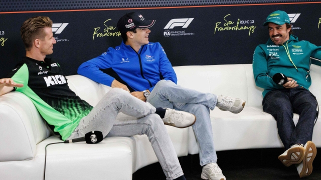Kick Sauber's German driver Nico Hulkenberg (L), Alpine's Argentinian driver Franco Colapinto and Aston Martin's Spanish driver Fernando Alonso address a press conference ahead of the Spa-Francorchamps Formula One Grand Prix of Belgium race, in Spa-Francorchamps, on July 24, 2025. (Photo by Simon Wohlfahrt / AFP)