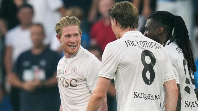 Napoli's Kevin De Bruyne celebrates with Napoli's Scott Mc Tominay after scoring the 0-2 goal for his team during the Serie A soccer match between Sassuolo and Napoli at the Mapei Stadium Città del Tricolore in Reggio Emilia, north Italy - Saturday, August 23, 2025 - Sport - Soccer - (Photo by Massimo Paolone/LaPresse)