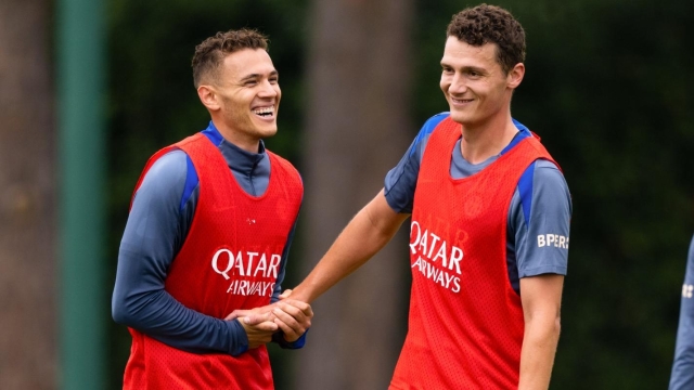 Kristjan Asllani of FC Internazionale and Benjamin Pavard of FC Internazionale smile during the FC Internazionale training session at BPER Training Centre at Appiano Gentile on September 20, 2024 in Como, Italy. (Photo by Mattia Pistoia - Inter/Inter via Getty Images)