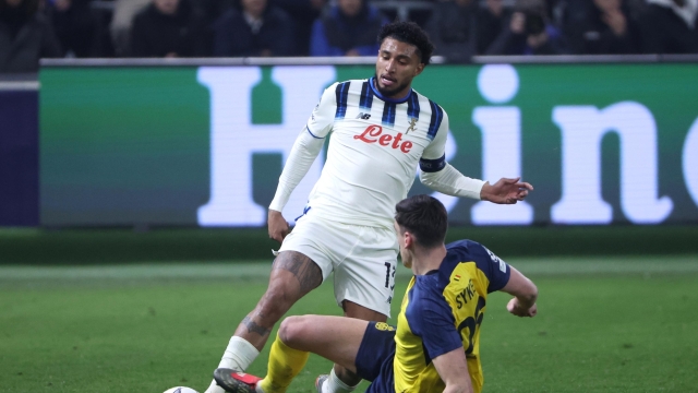 Atalanta's Ederson, left, and Union SG's Ross Sykes challenge for the ball during the Champions League opening phase soccer match between Union Saint-Gilloise and Atalanta, in Brussels, Wednesday, Jan. 28, 2026. (AP Photo/Omar Havana)