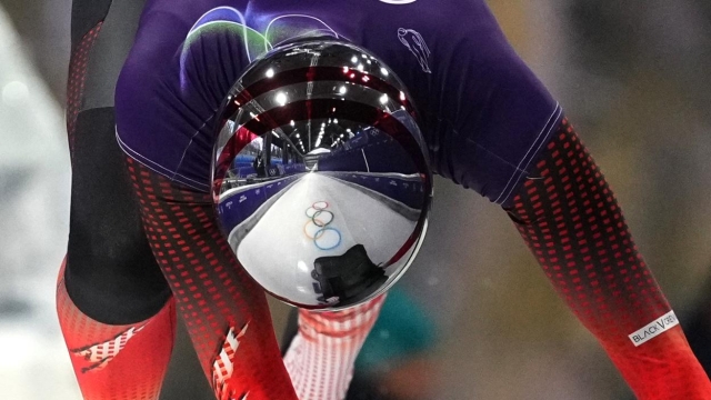 Austria's Janine Flock starts for a women's skeleton training session at the 2026 Winter Olympics, in Cortina d'Ampezzo, Italy, Monday, Feb. 9, 2026. (AP Photo/Alessandra Tarantino)