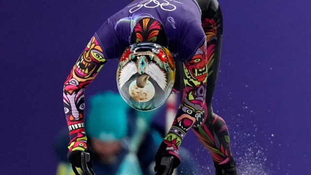 Puerto Rico's Kellie Delka starts for a women's skeleton training session at the 2026 Winter Olympics, in Cortina d'Ampezzo, Italy, Monday, Feb. 9, 2026. (AP Photo/Alessandra Tarantino)