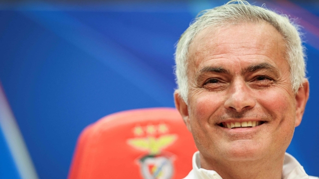 (FILES) Benficas coach Jose Mourinho reacts during a press conference on the eve of their UEFA Champions League knockout round play-off first leg football match against Real Madrid at Benfica Campus in Seixal, outskirts of Lisbon, on February 16, 2026. Real Madrid officially announced on June 11, 2026, the return of Portuguese coach JosE Mourinho, thirteen years after he left the club, this time on a three-season deal running until 2029. His signing had been considered a done deal for days, after Florentino Perez was re-elected as Real Madrid's president (Photo by PATRICIA DE MELO MOREIRA / AFP)