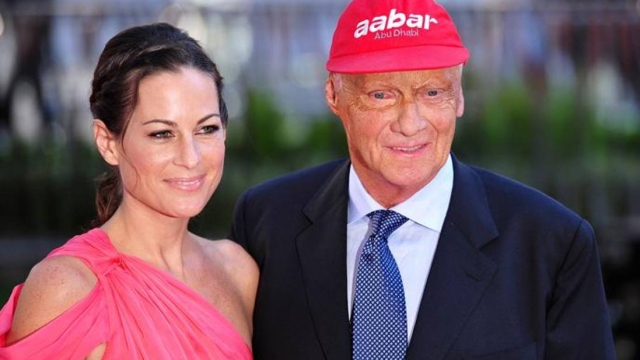 (FILES) In this file photo taken on September 03, 2013 Austrian former Formula 1 racing driver Niki Lauda and his wife Birgit attend the world premiere of Rush in central London. - Legendary Formula One driver Niki Lauda has died at the age of 70, his family said in a statement released to Austrian media on May 21, 2019. (Photo by CARL COURT / AFP)