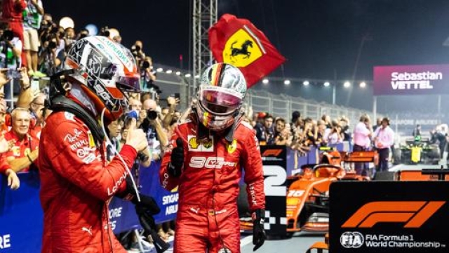 Charles Leclerc e Sebastian Vettel al termine del GP di Singapore. Getty