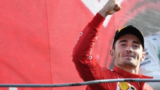 Charles Leclerc esulta sul podio di Monza. Ansa