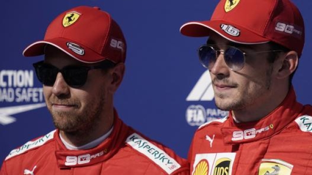 Sebastian Vettel e Charles Leclerc. Afp