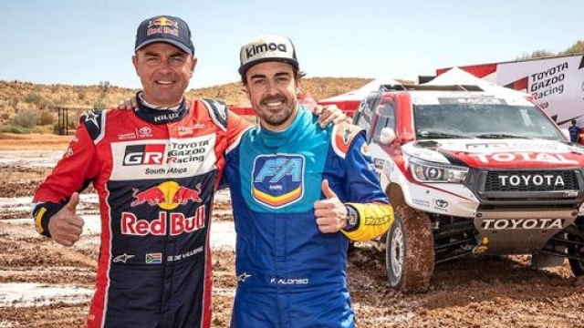 Fernando Alonso al rally del Marocco al fianco del vincitore il sudafricano Giniel de Villiers