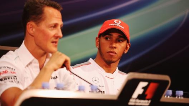 Michael Schumacher con un giovane Lewis Hamilton nel 2012. Getty