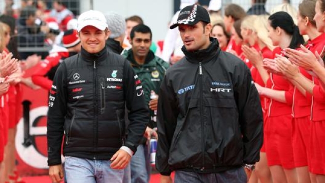 Liuzzi con Rosberg nel 2011. Lapresse