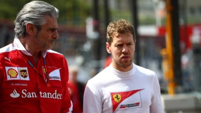 L’ex team principal Ferrari, Maurizio Arrivabene, con Sebastian Vettel