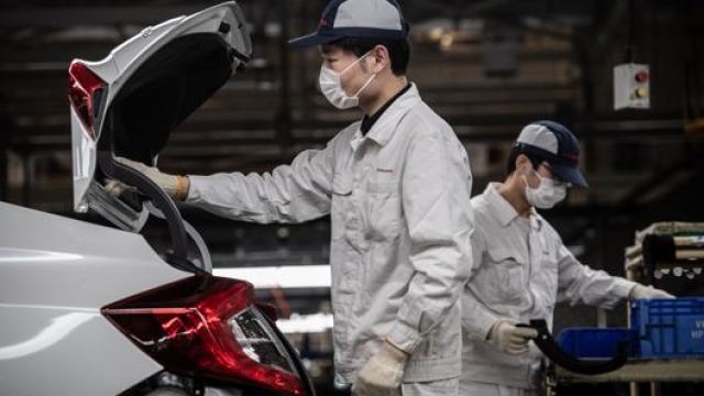 Lo stabilimento Honda di Wuhan  di nuovo in attività. Afp