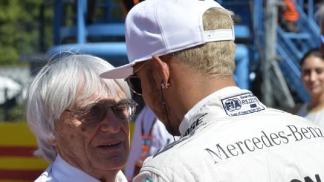 Bernie Ecclestone e Lewis Hamilton faccia a faccia nel 2015. Afp