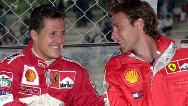 Michael Schumacher con Luca Badoer in Ferrari. Ap