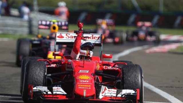 Vettel trionfa in Ungheria nel 2015 con il #5 sulla sua Ferrari. Lapresse
