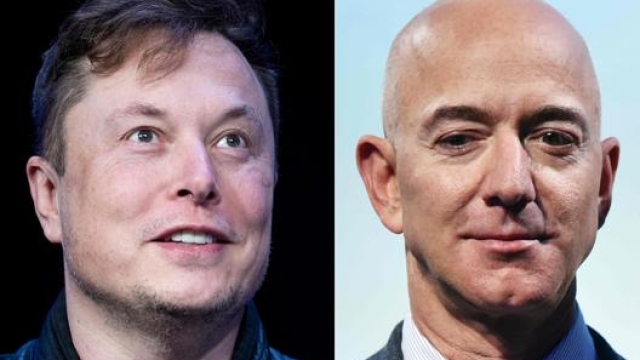 Elon Musk e Jeff Bezos sono i due uomini più ricchi della terra. Afp