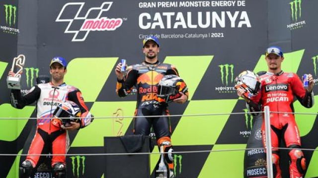 Il podio della gara della MotoGP in catalogna: Oliveira, Zarco e Miller