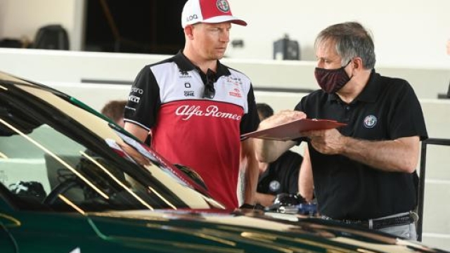 Kimi Raikkonen con Domenico Bagnasco, responsabile del progetto Alfa Romeo Giulia GTA