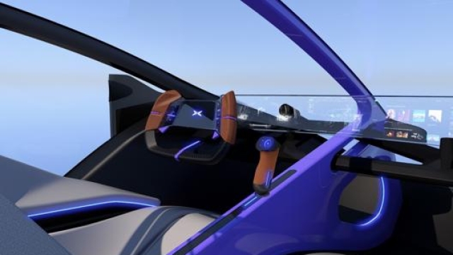 Gli interni dell’auto volante saranno high-tech, con un sistema di infotainment trasparente e un display digitale integrato nel volante
