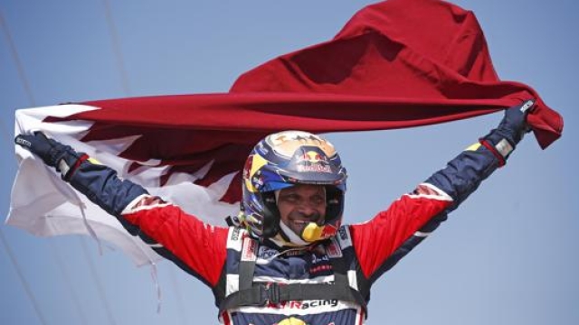Nasser Al Attiyah  può sorridere: per la quarta volta in carriera conquista la Dakar. Epa