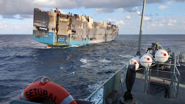 This undated handout image released on March 1, 2022 by Marinha Portuguesa (Portuguese Navy) shows the merchant ship Felicity Ace adrift after a fire broke out on board on February 16 off the Portuguese coast. - A freighter carrying thousands of luxury vehicles which caught fire almost two weeks ago off the Azores archipelago, got shipwrecked on March 1, 2022, the Portuguese Navy announced. (Photo by Handout / Portuguese Navy / AFP) / RESTRICTED TO EDITORIAL USE - MANDATORY CREDIT "AFP PHOTO / PORTUGUESE NAVY-MARINHA PORTUGUESA" - NO MARKETING - NO ADVERTISING CAMPAIGNS - DISTRIBUTED AS A SERVICE TO CLIENTS