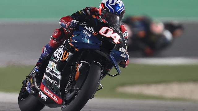 WithU Yamaha RNF MotoGP Team's Italian rider Andrea Dovizioso competes during the Moto GP Grand Prix of Qatar at the Lusail International Circuit, in the city of Lusail on March 6, 2022. (Photo by KARIM JAAFAR / AFP)