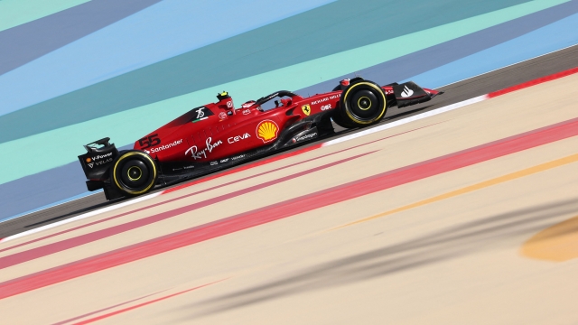 TOPSHOT - Ferrari's Spanish driver Carlos Sainz Jr drives during the first practice session ahead of the Bahrain Formula One Grand Prix at the Bahrain International Circuit in the city of Sakhir on March 18, 2022. (Photo by Giuseppe CACACE / AFP)