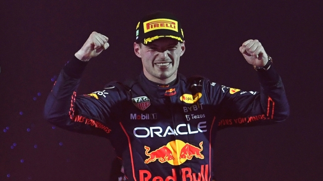 epa09853570 Dutch Formula One driver Max Verstappen of Red Bull Racing celebrates on the podium after winning the Formula One Grand Prix of Saudi Arabia on the Corniche Circuit in Jeddah, Saudi Arabia, 27 March 2022.  EPA/STR