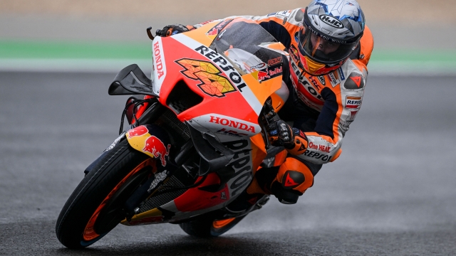 Honda Spanish rider Pol Espargaro takes part in the first practice session of the MotoGP Portuguese Grand Prix at the Algarve International Circuit in Portimao on April 22, 2022. (Photo by PATRICIA DE MELO MOREIRA / AFP)