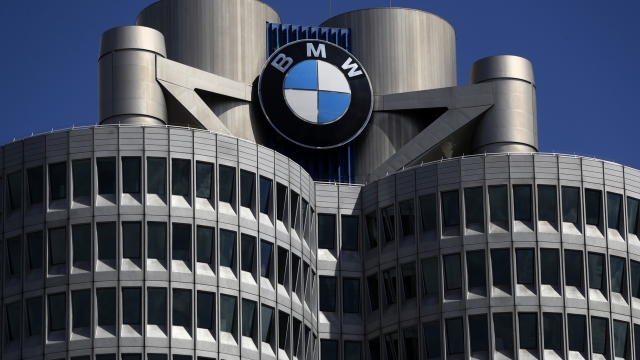 FILE - The logo of German car manufacturer BMW is fixed at the headquarters in Munich, Germany, May 14, 2021. German automaker BMW reports second-quarter earnings on Tuesday Aug. 3, 2021. BMW said Wednesday, March 16, 2022 that bottlenecks at its suppliers in Ukraine have forced it to adjust or interrupt production at a number of factories, which is likely to have a negative impact on auto sales figures. (AP Photo/Matthias Schrader, file)
