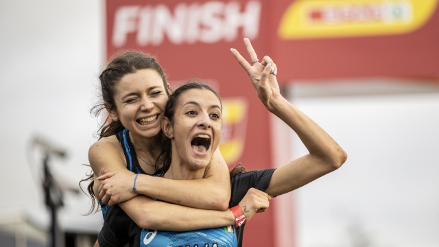 DUBLIN, IRELAND - DECEMBER 12: Nadia Battocletti ?of Italy celebrates with Anna Arnaudo of Italy after winning U23 Women race during SPAR European Cross Country Championships 2021 on December 12, 2021 in Sport Ireland National Cross Country Track in Sport Ireland Campus in Dublin, Ireland. (Photo by Maja Hitij/Getty Images for European Athletics